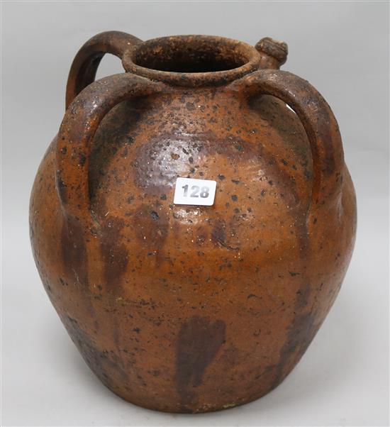 A 19th century terracotta three handled oil jar